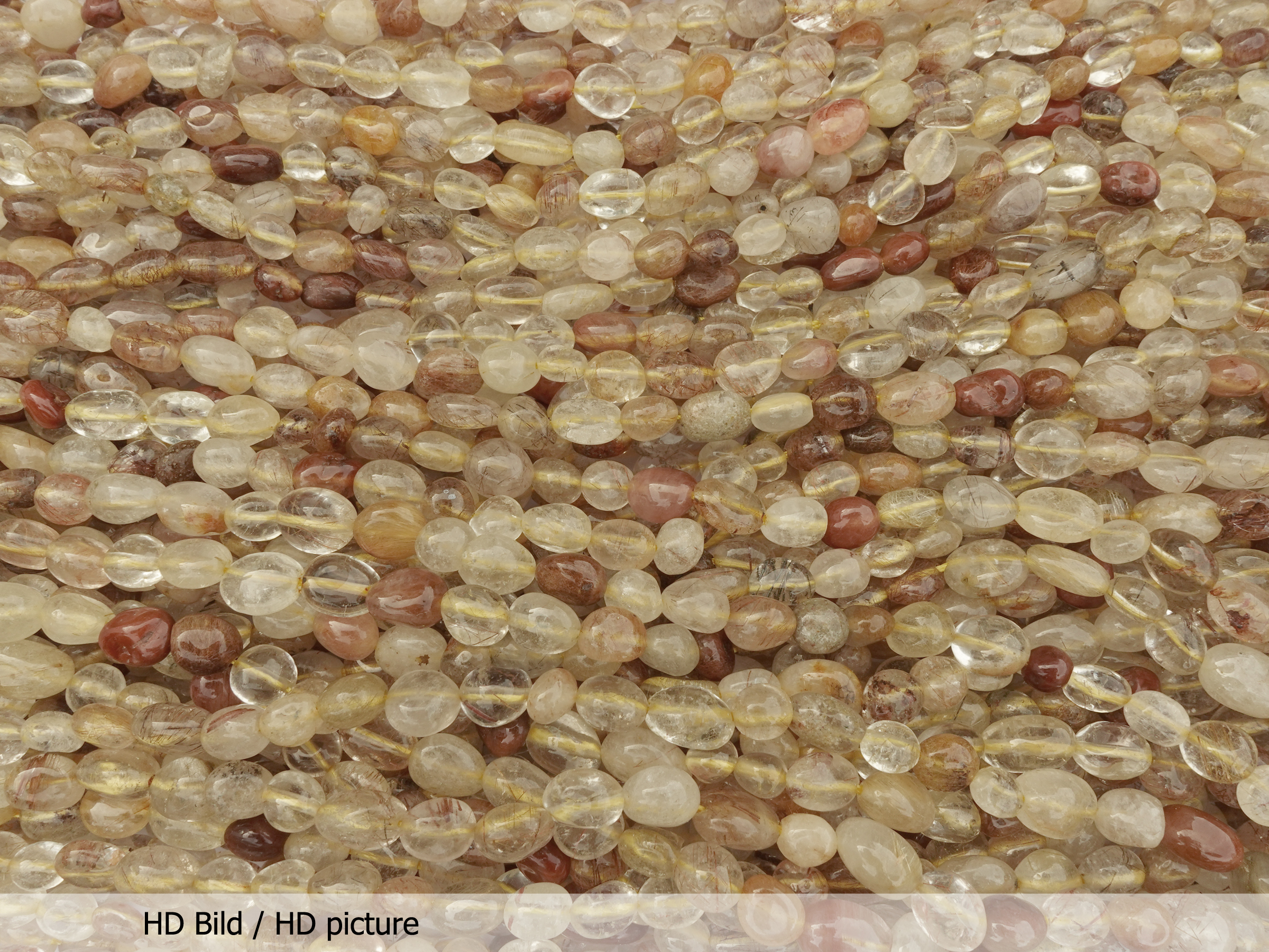 Rutilquarz Steinperlen 6x8mm zum Schmuckmachen - HD Bild