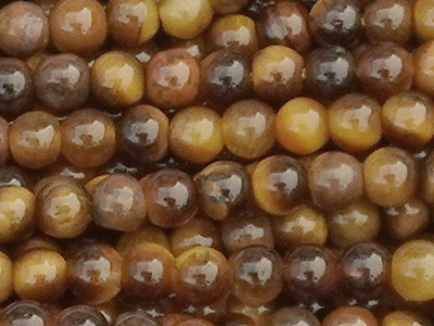 winzige runde Tigerauge Steinperlen 2mm - Nahaufnahme
