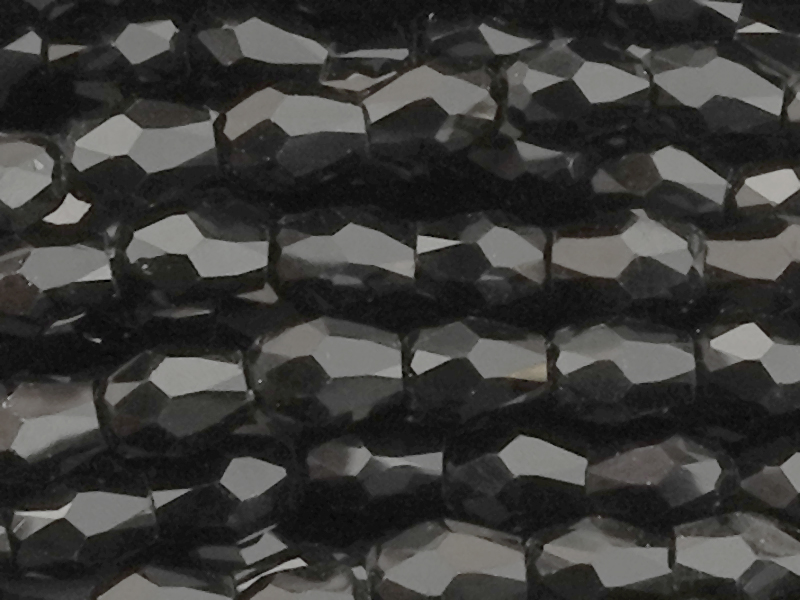 schwarze, kleine, facettierte Glasperlentropfen 3x4mm - Naha