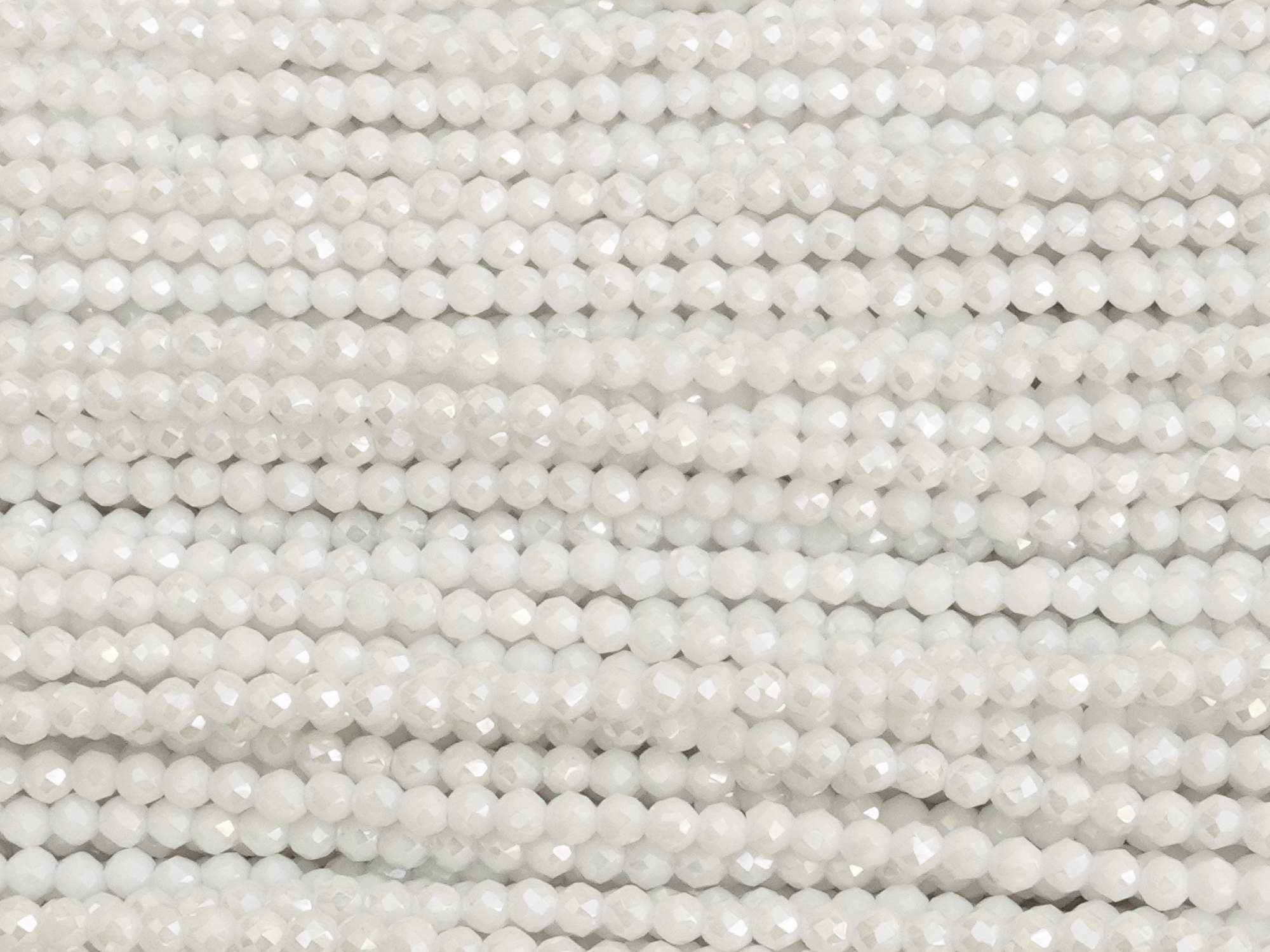 winzige, facettierte, geschlilffene runde Glasperlen 2mm, Fa