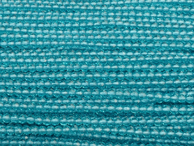 winzige türkise, geschlilffene runde Glasperlen 2mm