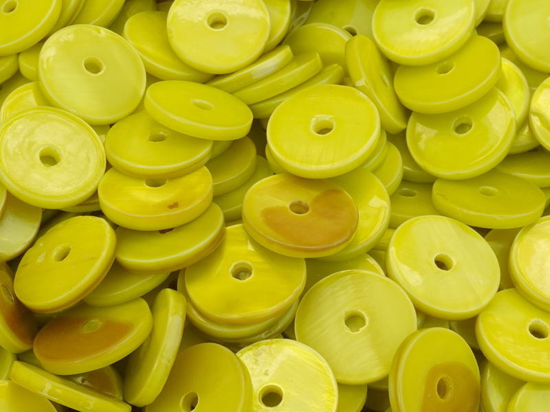 flat, green shell disc 12mm with a hole in the middle - clos