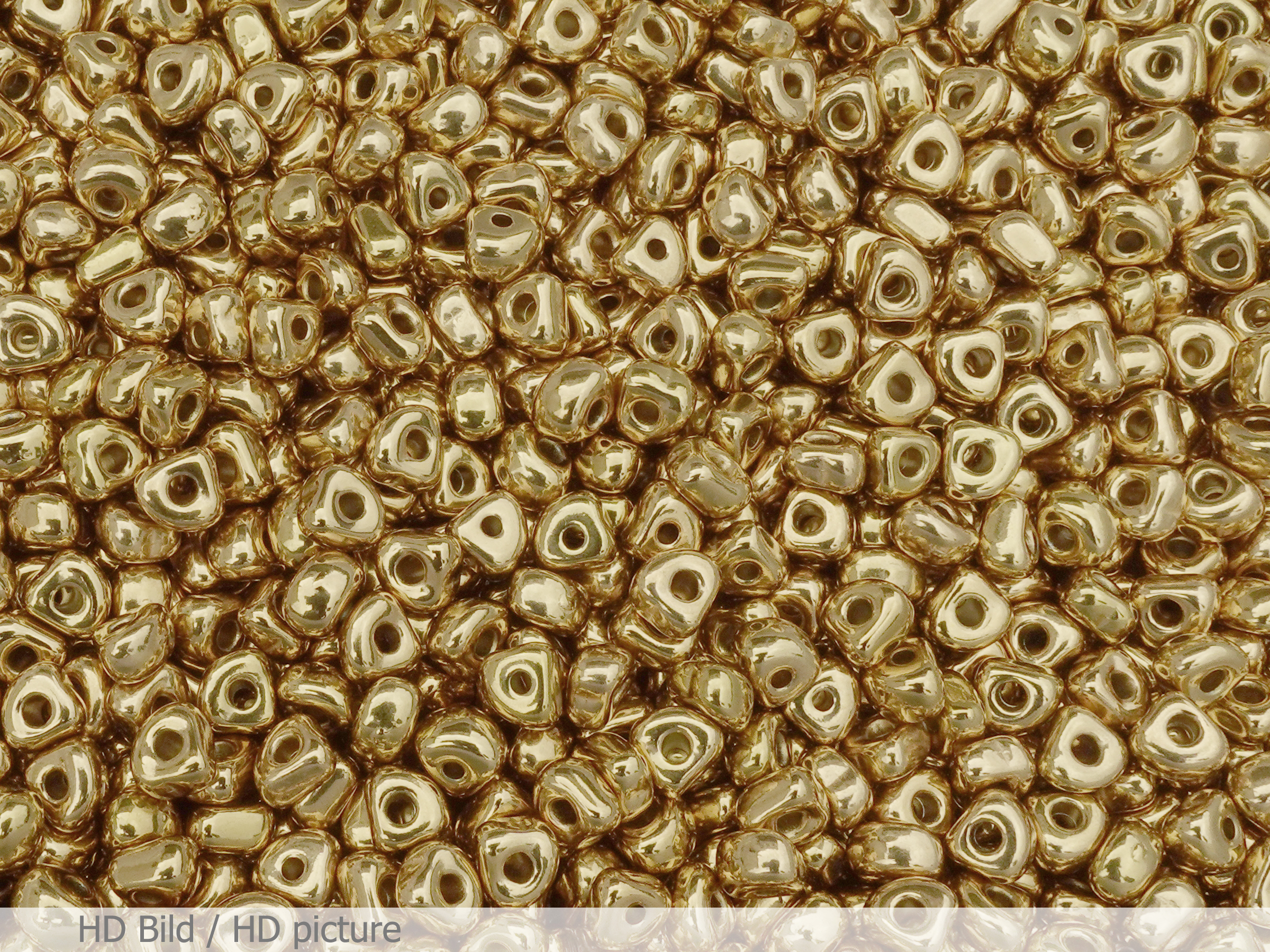 unregelmäßige goldene Edelstahlperlen ca. 5mm Zwischenteile