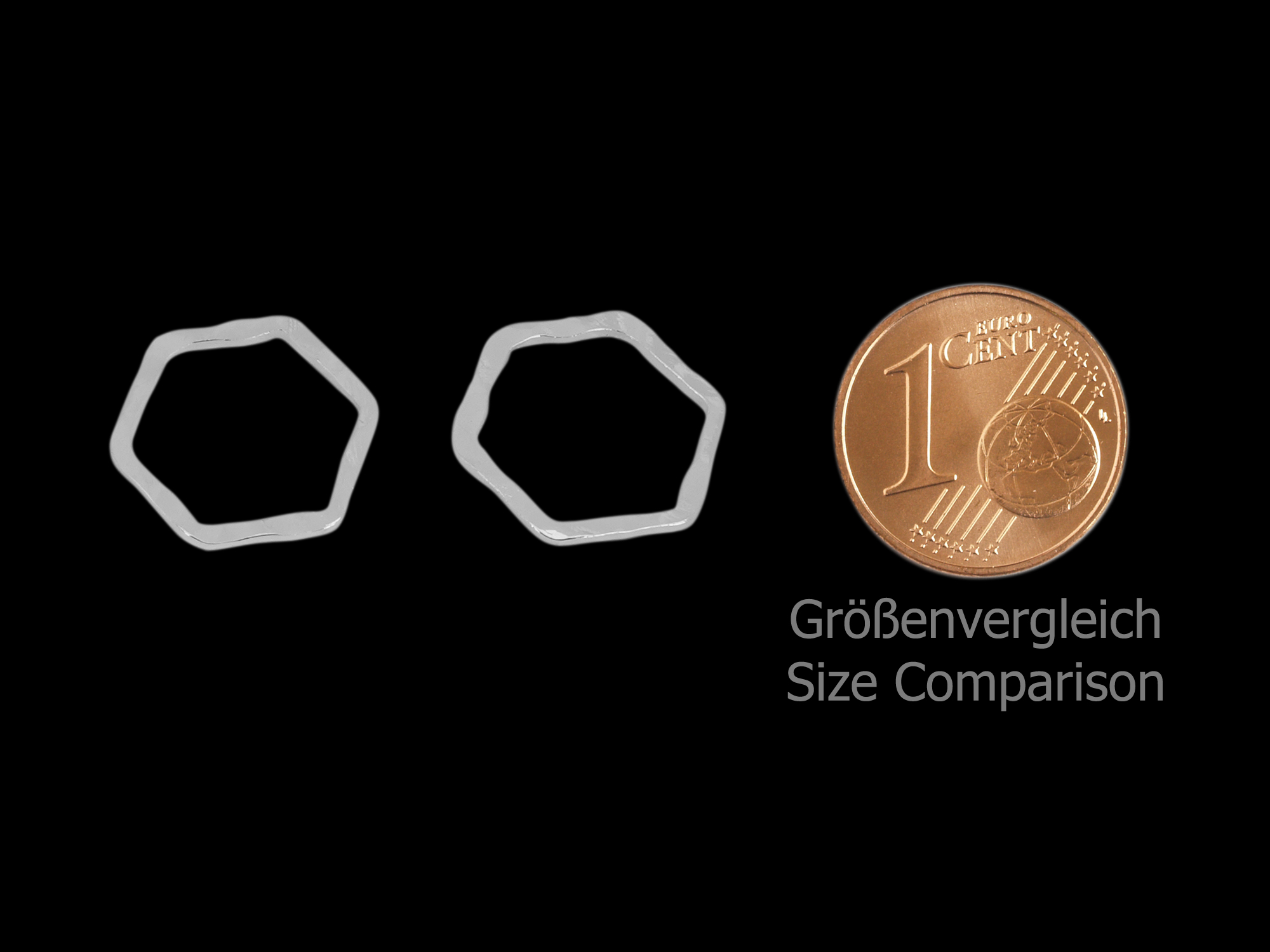 gehämmerte, silberfarbige, hexagonförmige Schmuckelemente -
