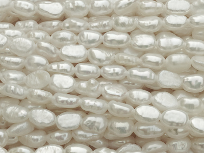 echte, weiße Zuchtperlen ca 5x3mm - Größenvergleich