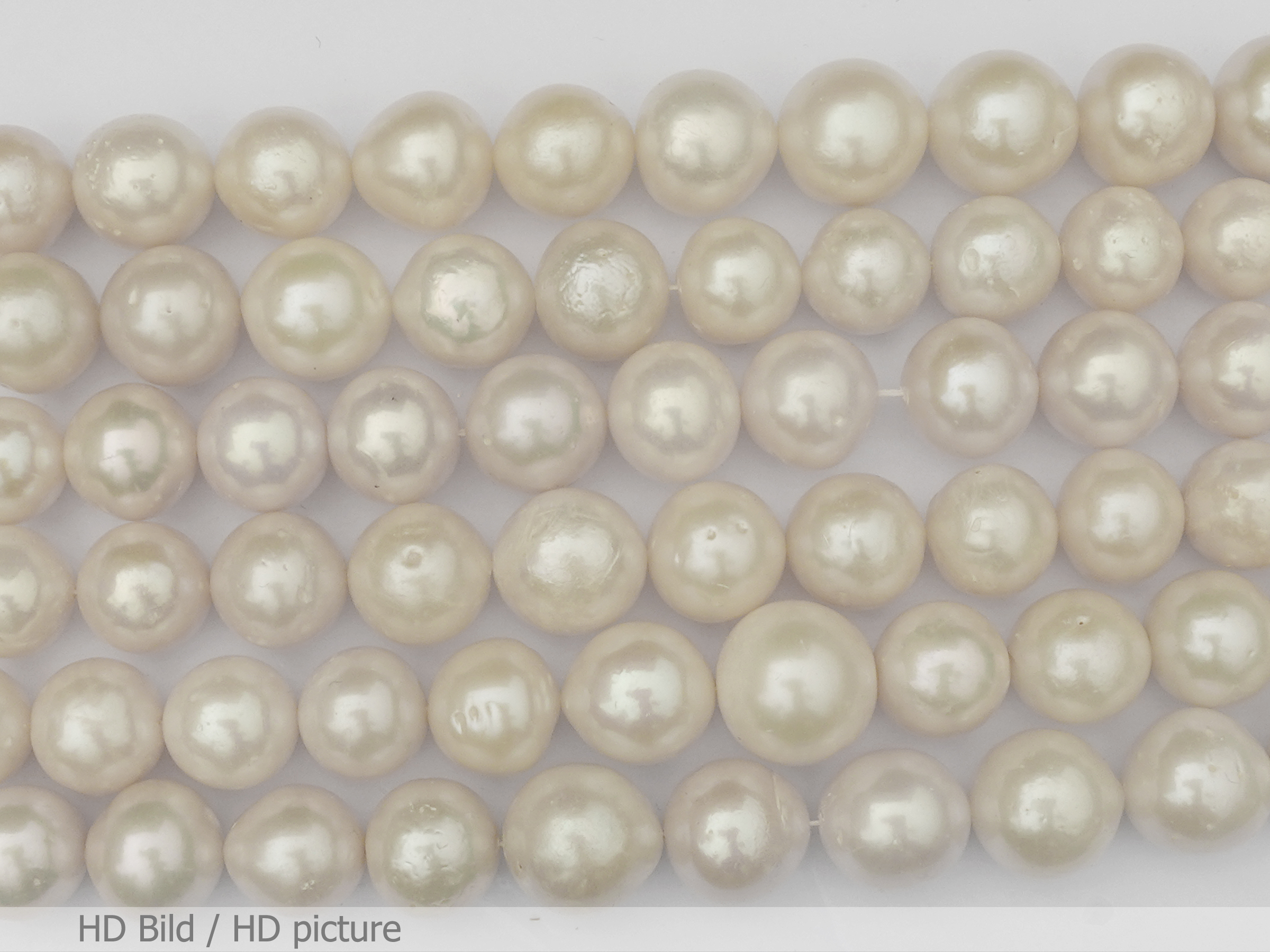 große runde Zuchtperlen, Kulturperlen