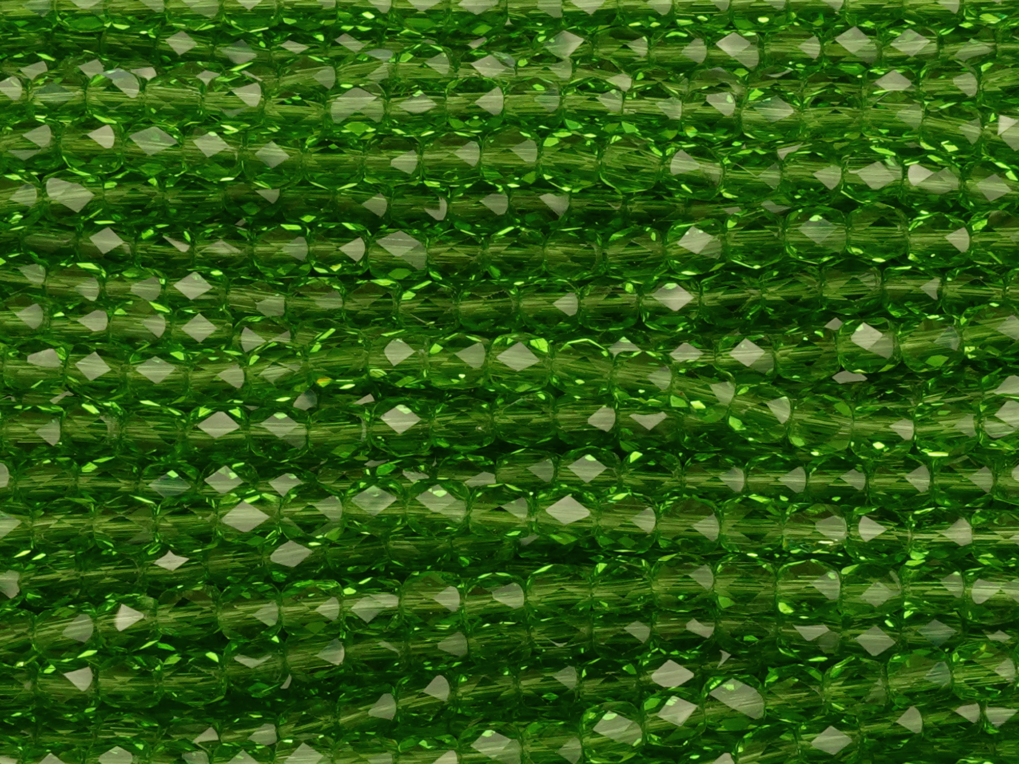 grüne, tönnchenförmige, facettierte Glitzerperlen 3mm zum Sc