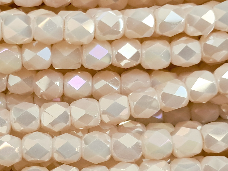 peach pink, barrel-shaped, faceted glass beads 3mm - close u