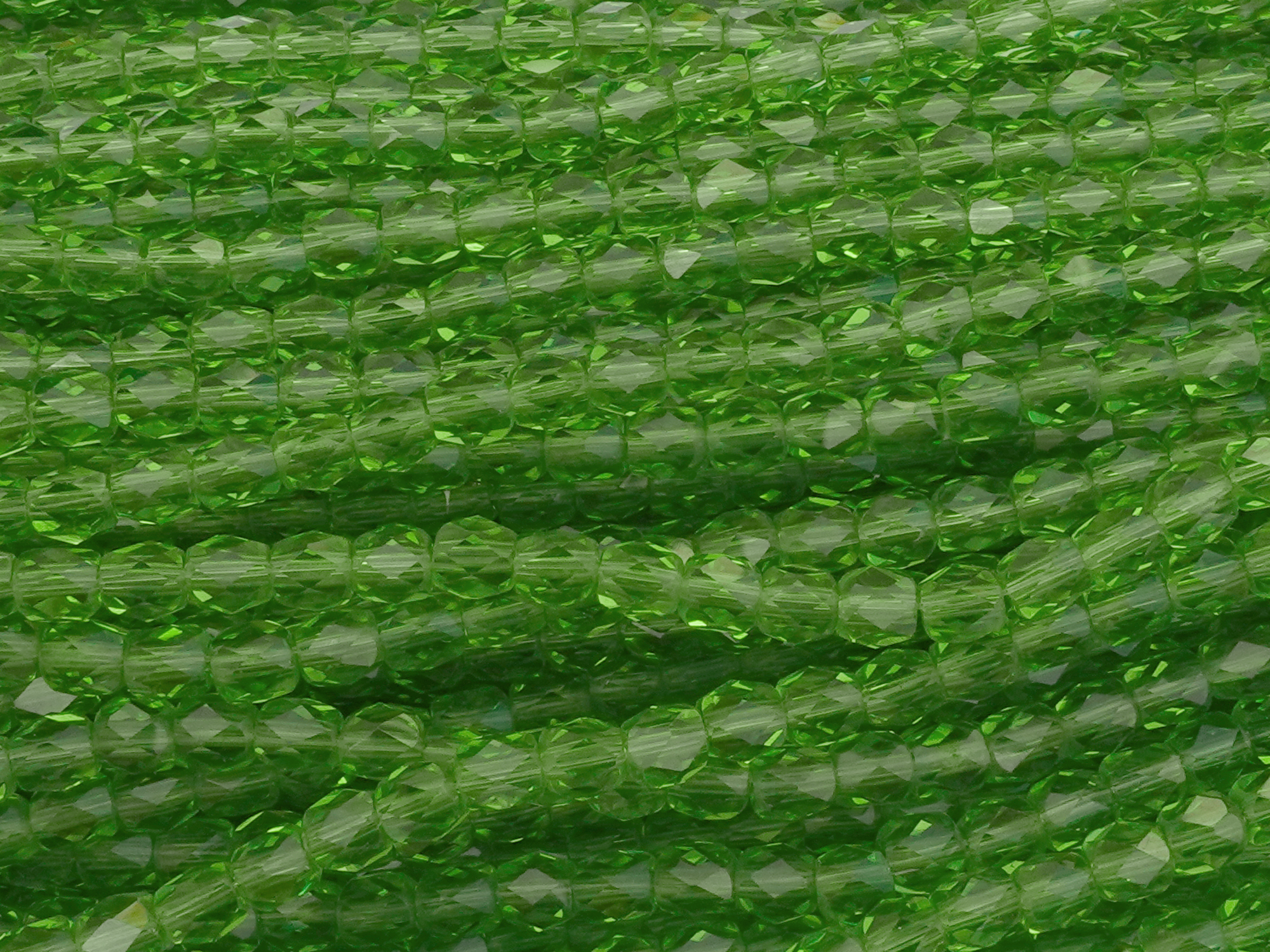 tönnchenförmige, facettierte Glasperlen 4mm, Farbe: Grün